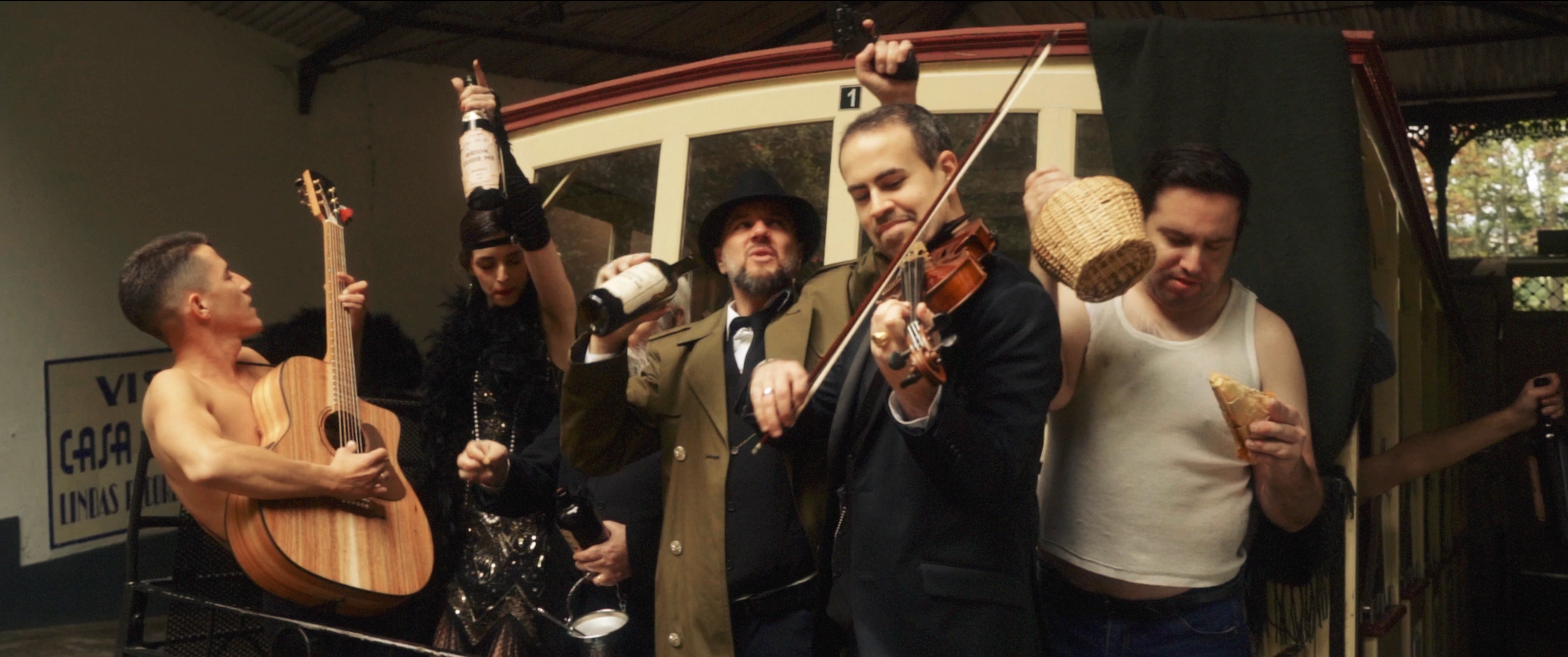 All the characters from Rafael Xavier's music video Orion, Guide Me gathered at the Bom Jesus do Monte Elevator, with E. Sousa portraying the corrupt politician and playing violin